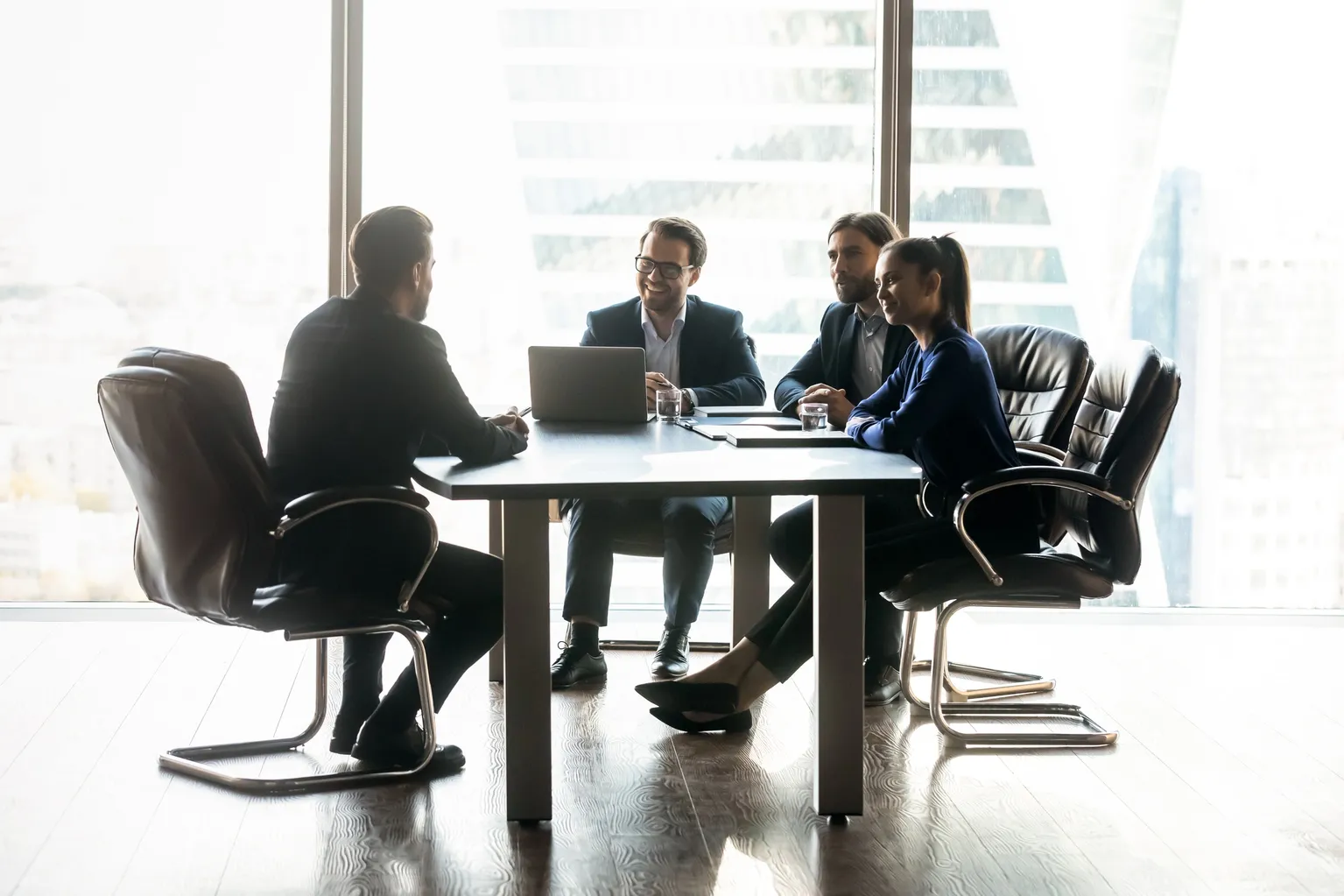 Executives around confrence table